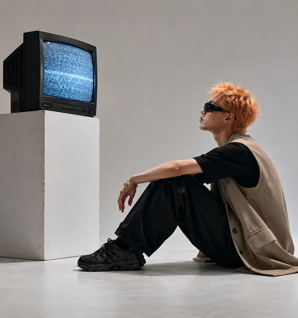 Terry John — filmmaker sitting in front of a CRT television
